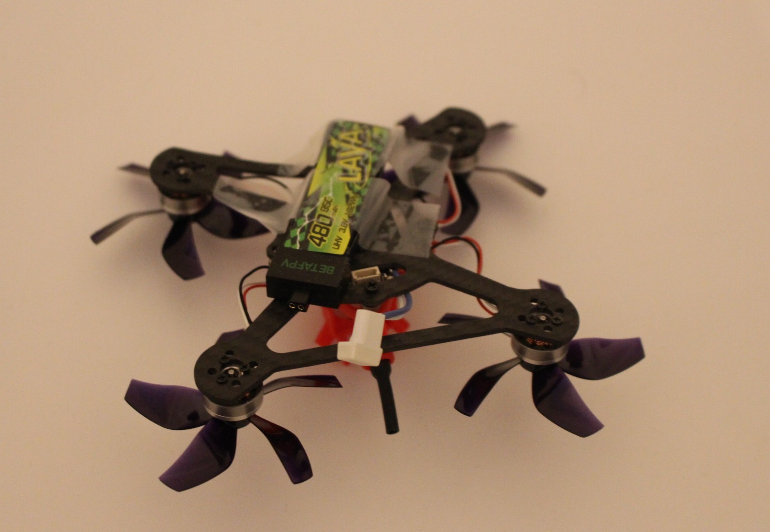 Close-up of drone battery, ESC, and wiring